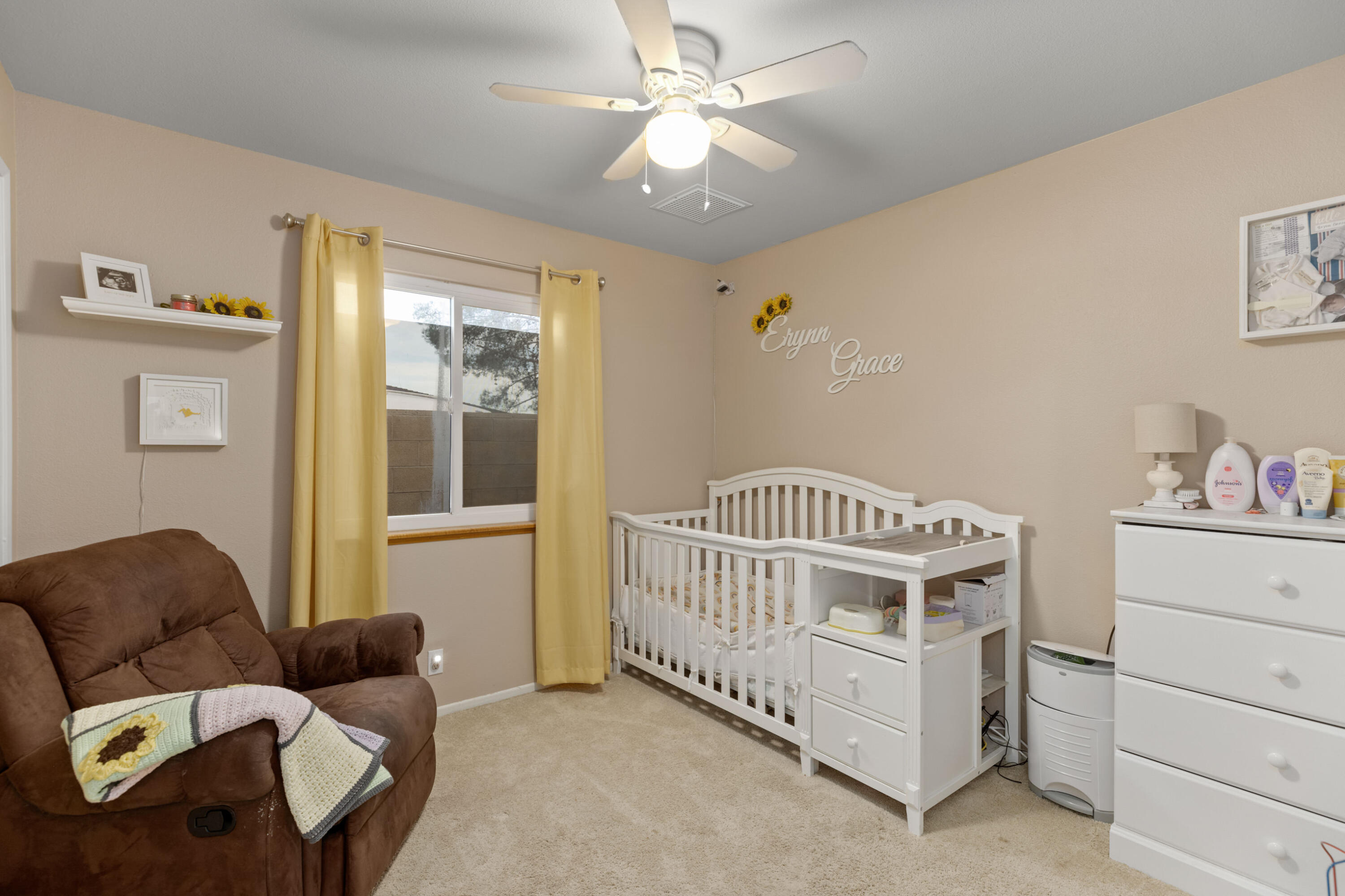 920 West Perch Avenue Ridgecrest, CA 93555 - Photo 21 of 26 a bedroom with furniture and a window