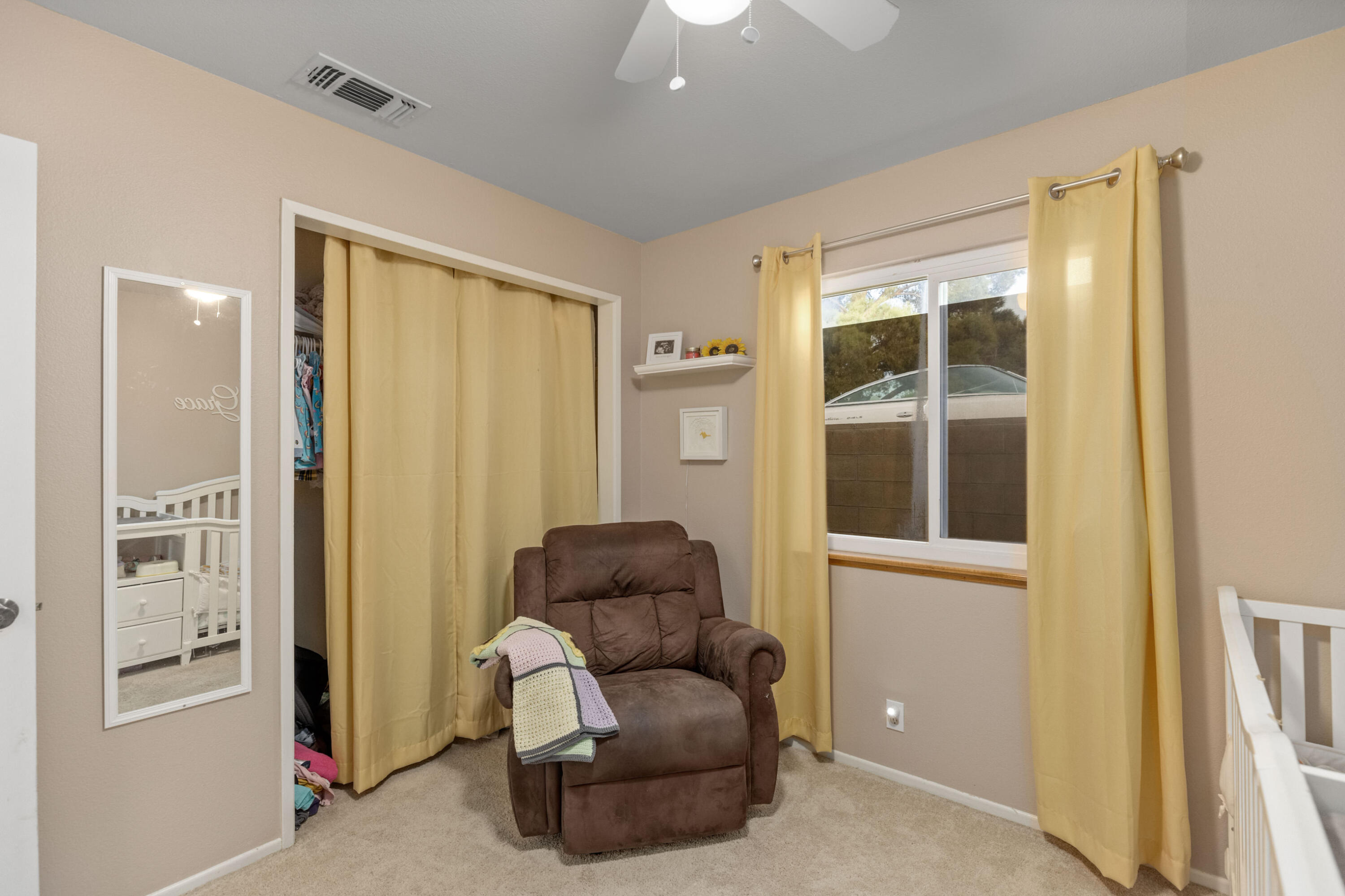 920 West Perch Avenue Ridgecrest, CA 93555 - Photo 22 of 26 a living room with furniture and a window