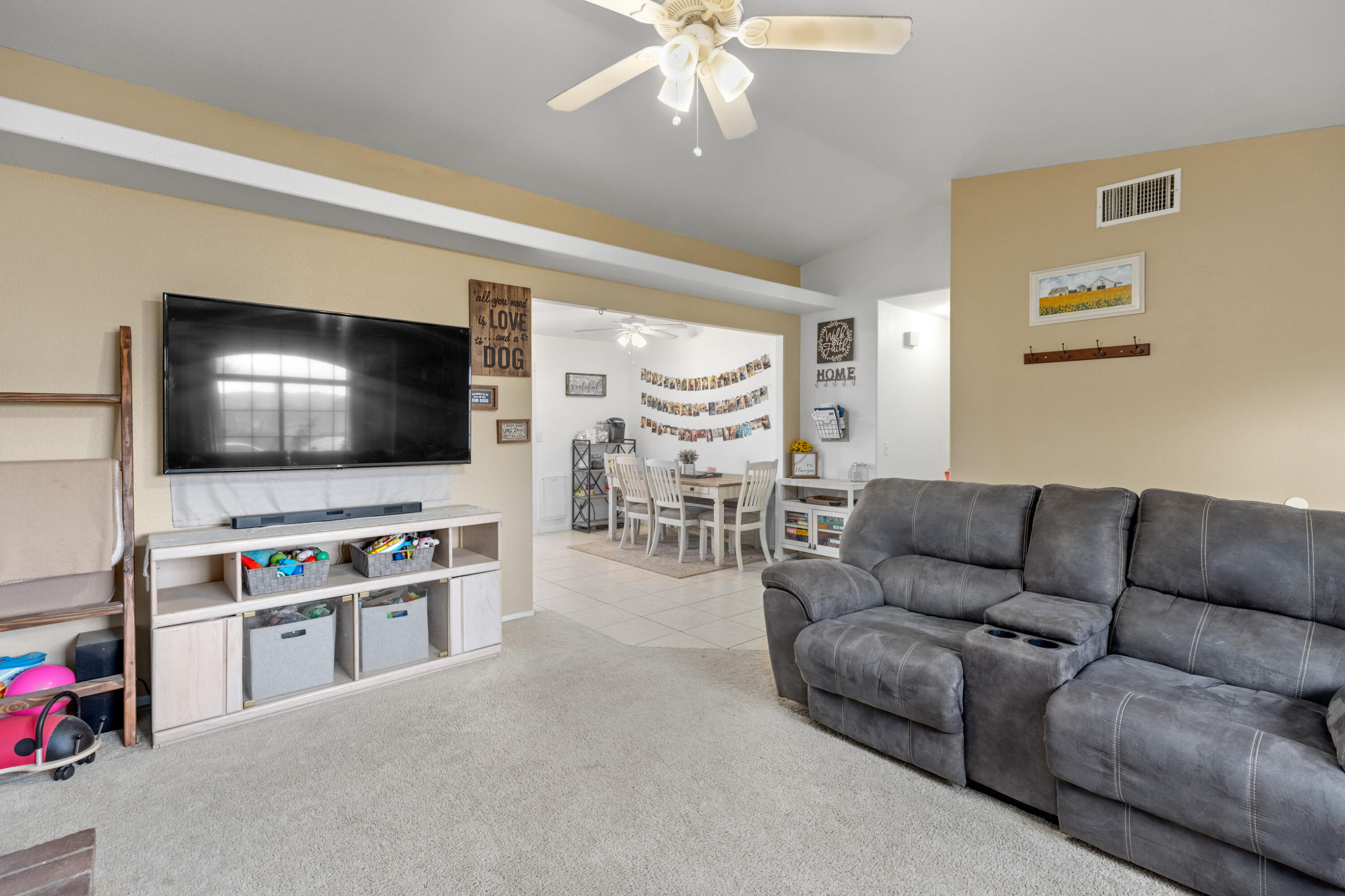 920 West Perch Avenue Ridgecrest, CA 93555 - Photo 4 of 26 a living room with furniture and a flat screen tv