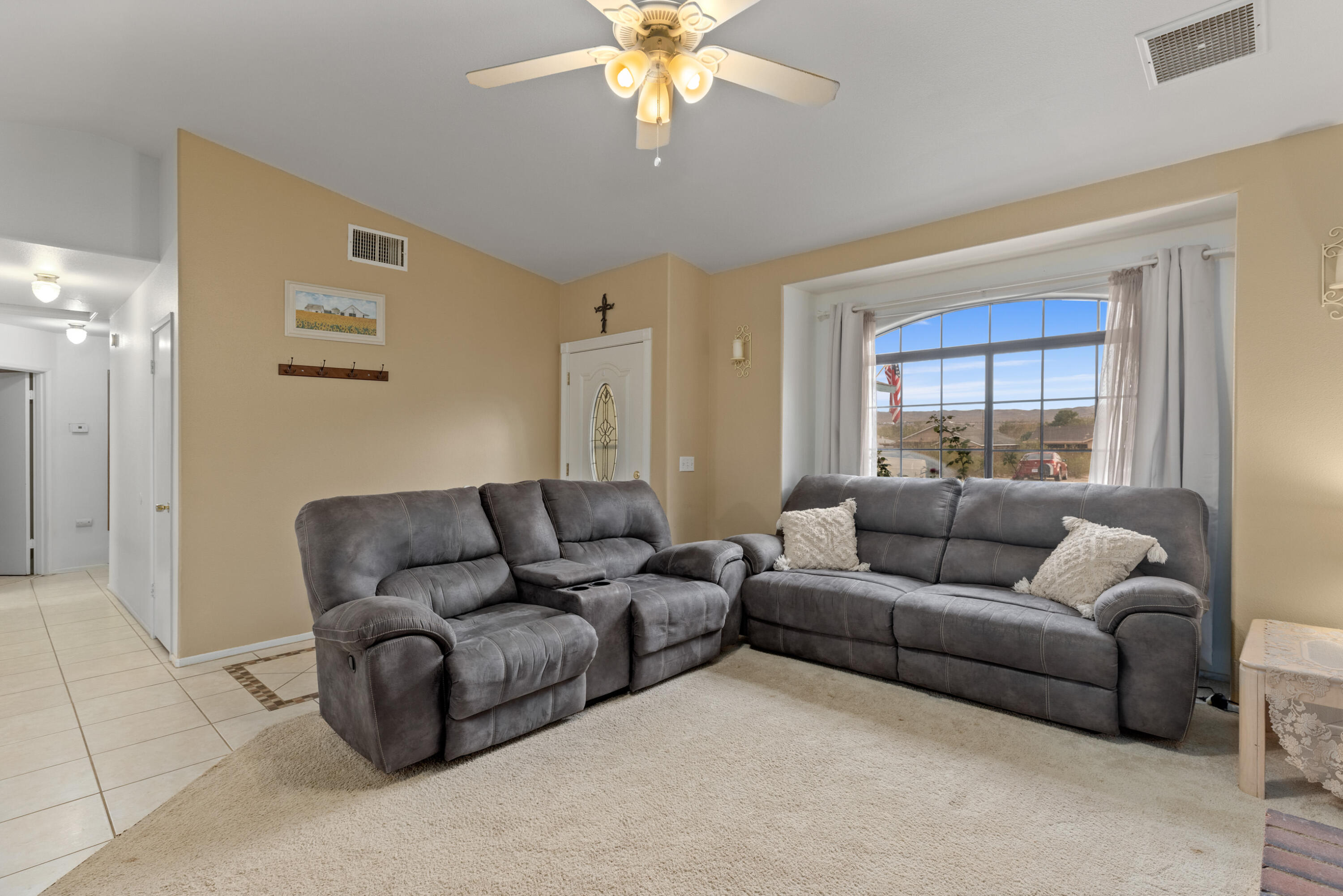 920 West Perch Avenue Ridgecrest, CA 93555 - Photo 5 of 26 a living room with furniture and a large window