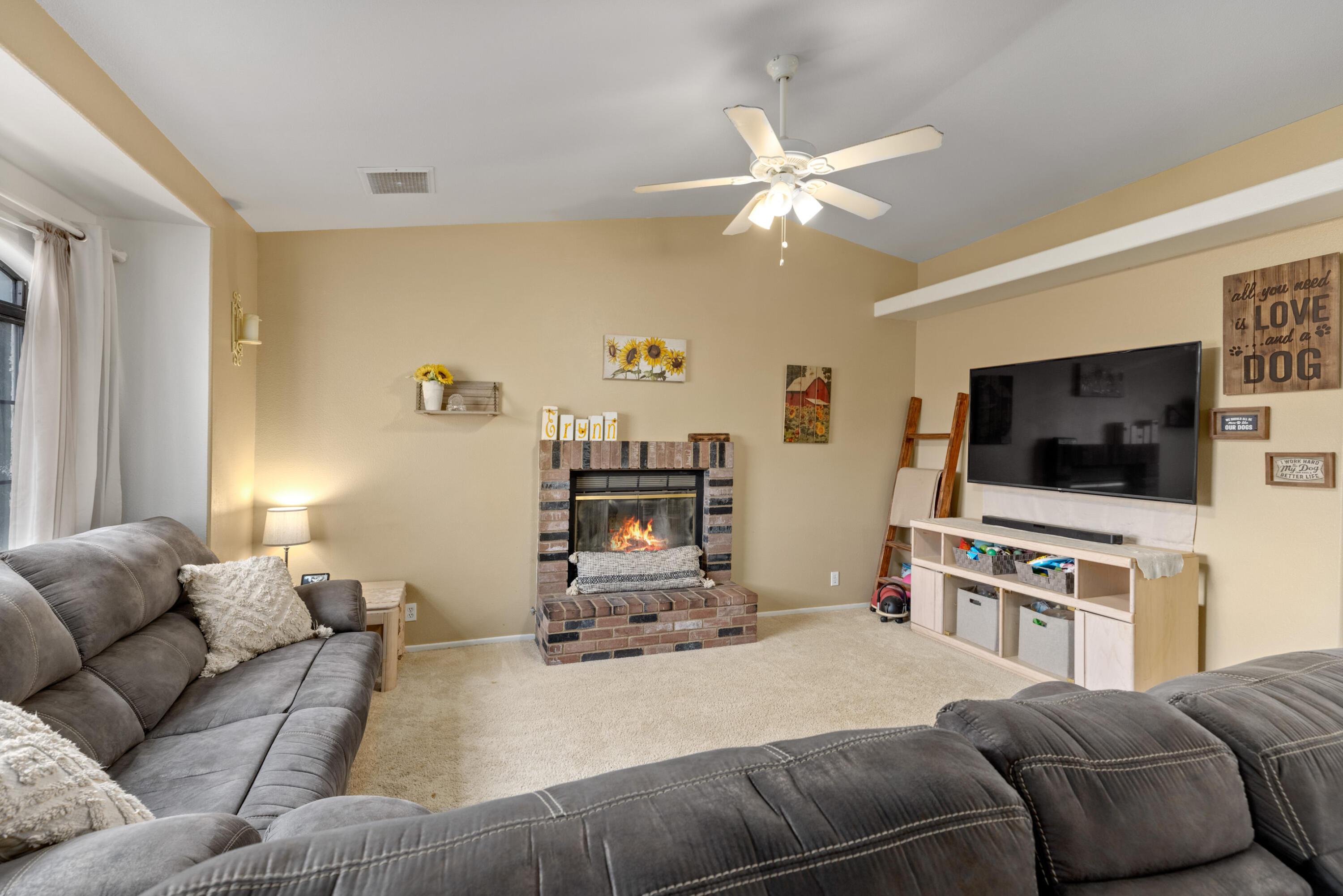 920 West Perch Avenue Ridgecrest, CA 93555 - Photo 6 of 26 a bedroom with a bed and a flat screen tv