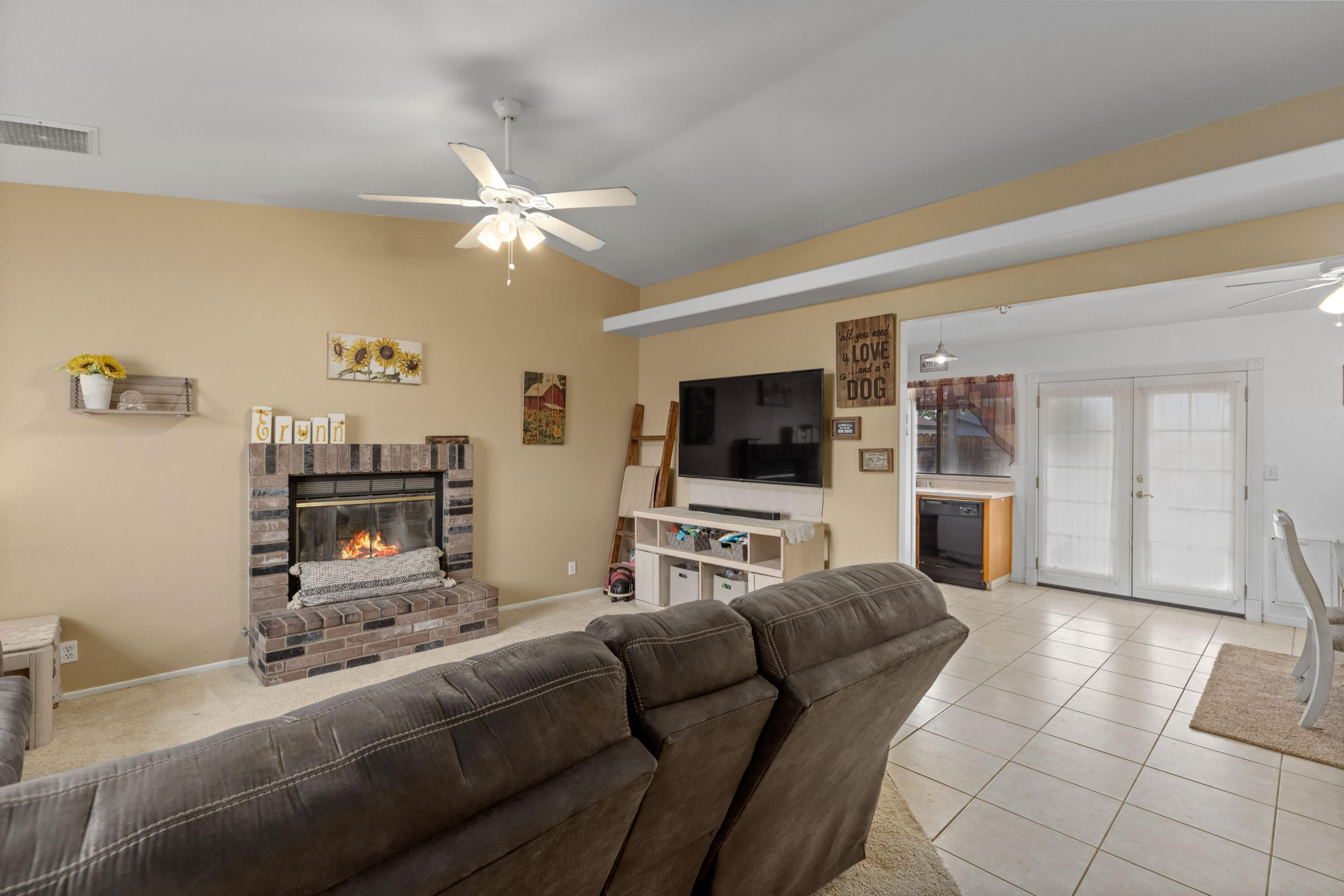 920 West Perch Avenue Ridgecrest, CA 93555 - Photo 7 of 26 a living room with furniture and a flat screen tv