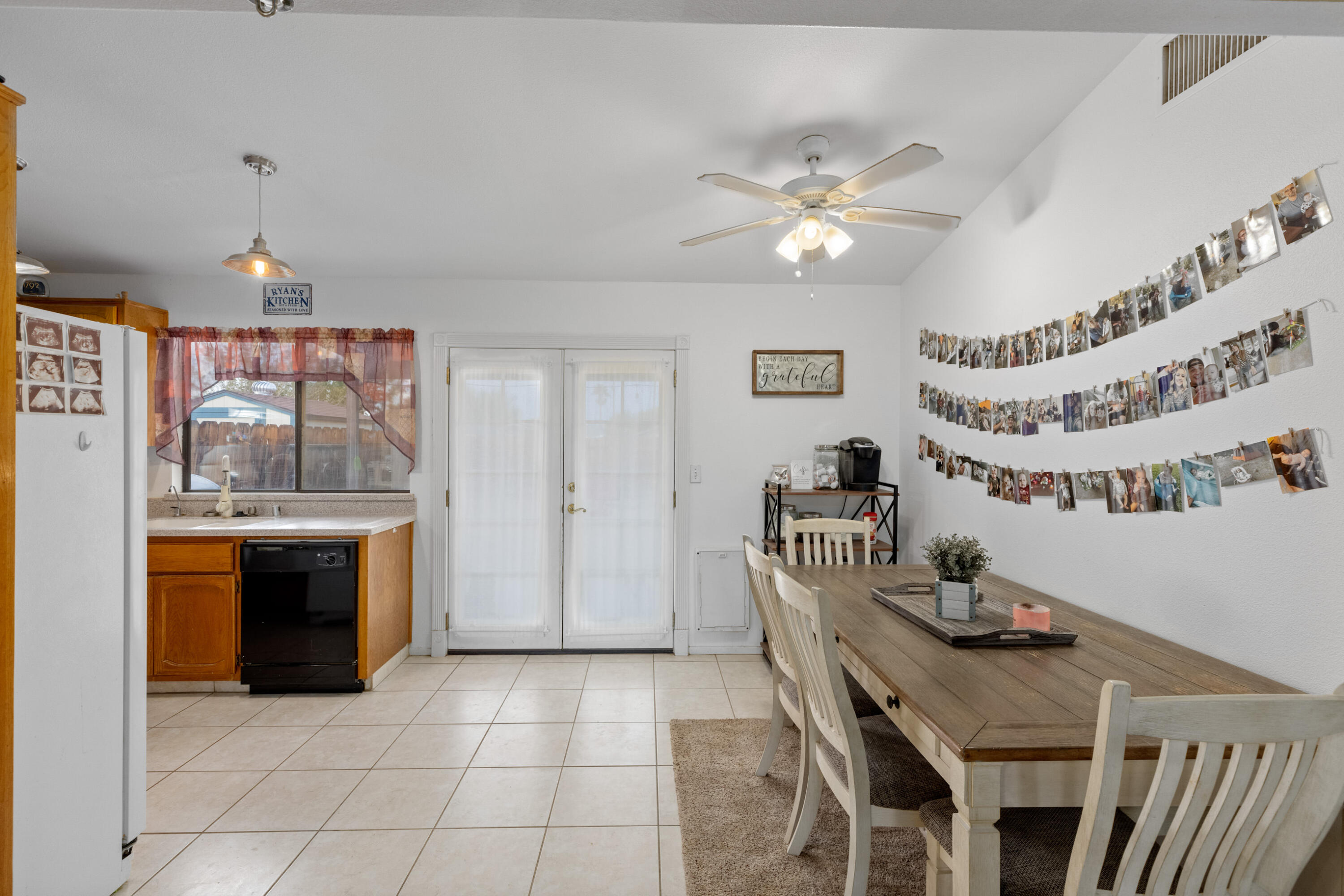920 West Perch Avenue Ridgecrest, CA 93555 - Photo 8 of 26 a kitchen with cabinets and window