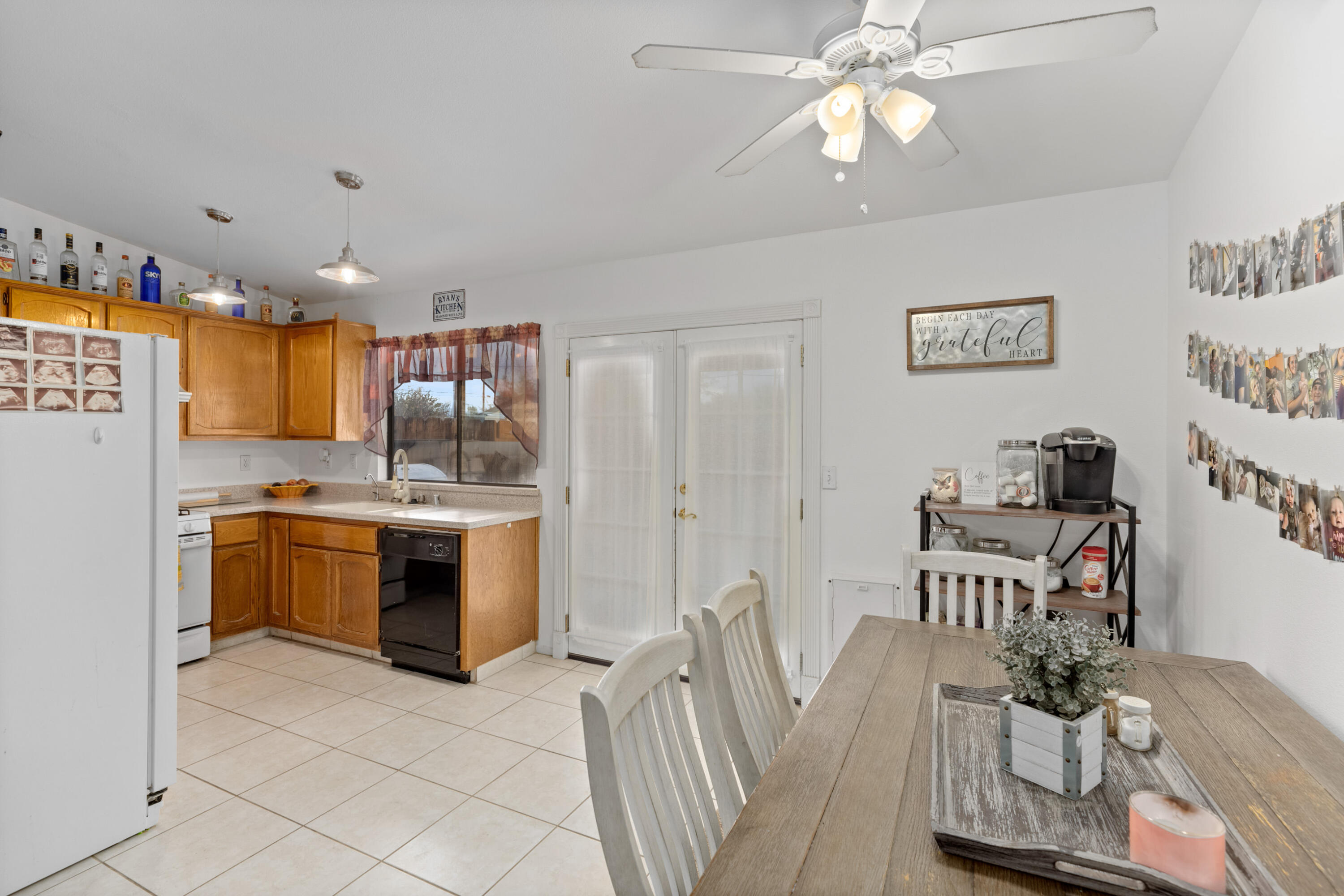 920 West Perch Avenue Ridgecrest, CA 93555 - Photo 9 of 26 a kitchen with stainless steel appliances granite countertop a sink cabinets and wooden floor