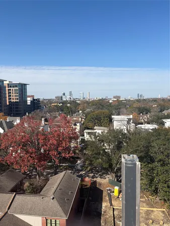 an aerial view of a city with lots of residential buildings