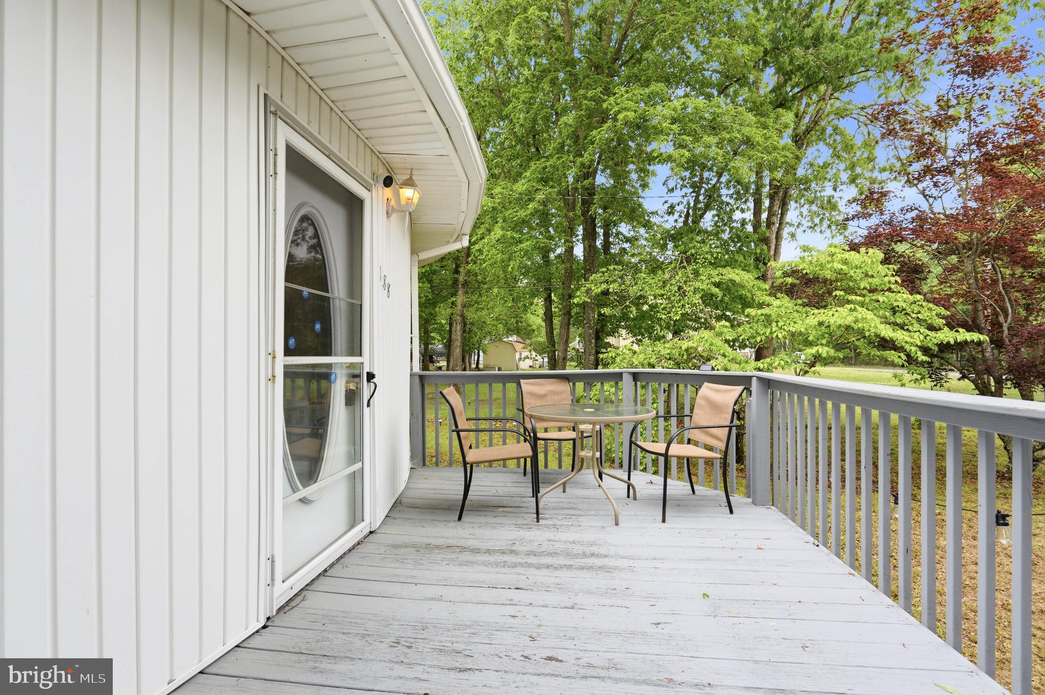 188 Carlisle Place Road Leesburg, NJ 08327 - Photo 5 of 36 a view of a balcony with chairs
