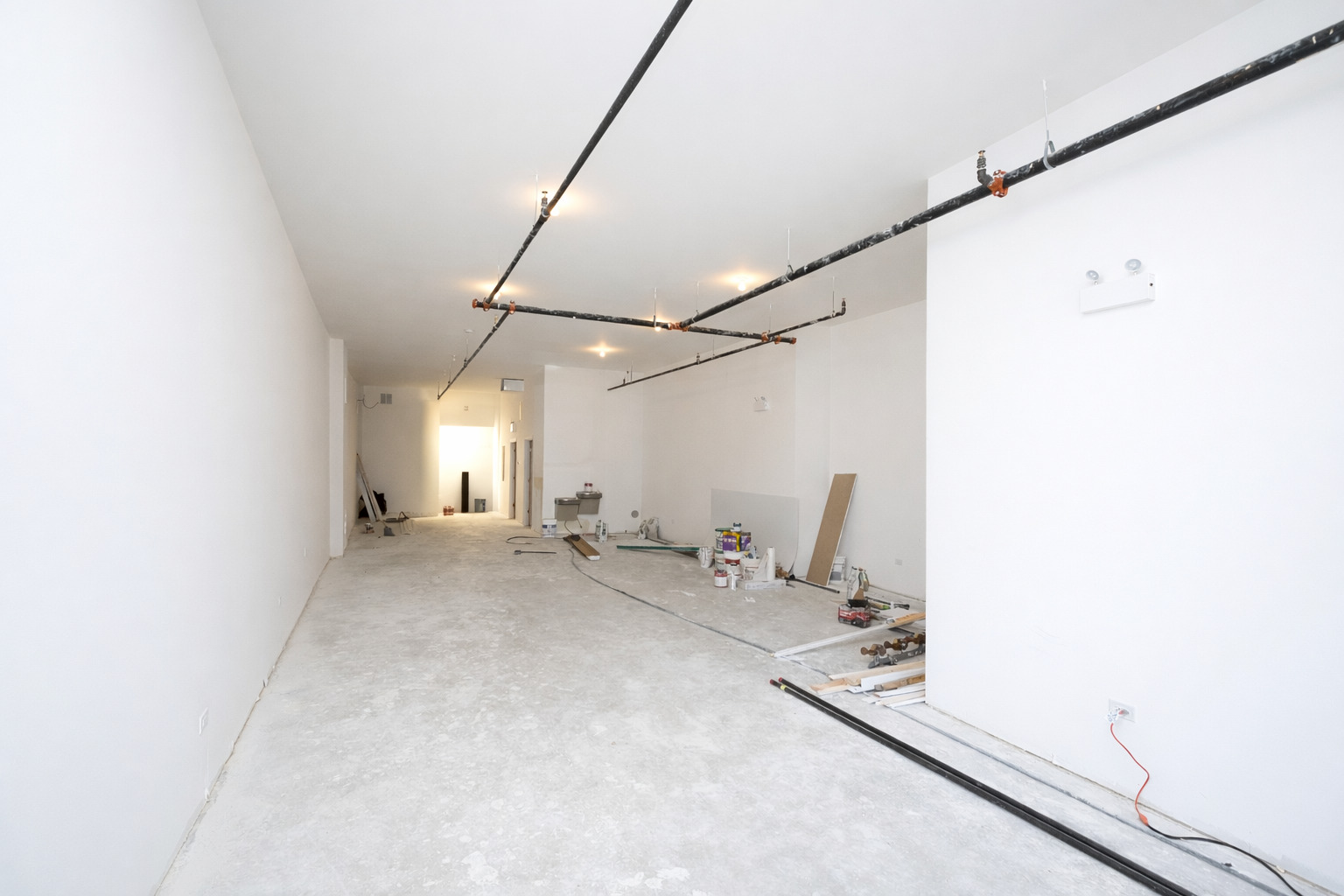 3122 South Morgan Street Chicago, IL 60608 - Photo 27 of 33 a view of storage and utility room with windows