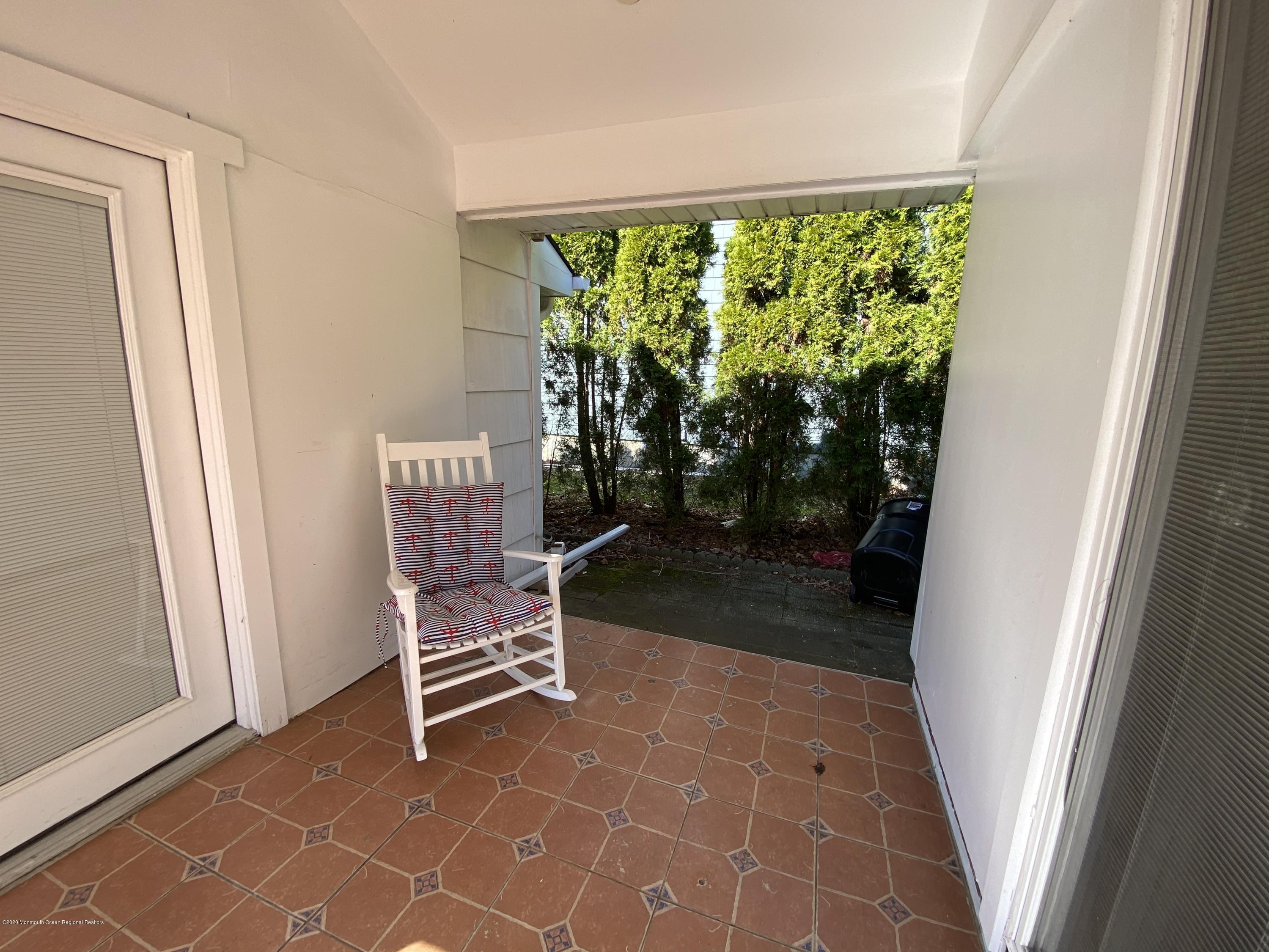 560 Central Avenue, Unit ANNUAL Spring Lake Heights, NJ 07762 - Photo 13 of 14 a view of a hardwood & door