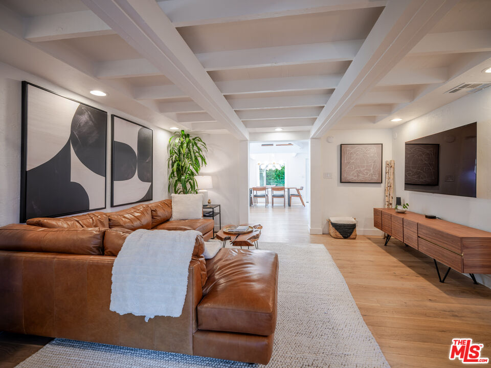 20922 Keller Road Topanga, CA 90290 - Photo 20 of 49 a living room with furniture and a flat screen tv