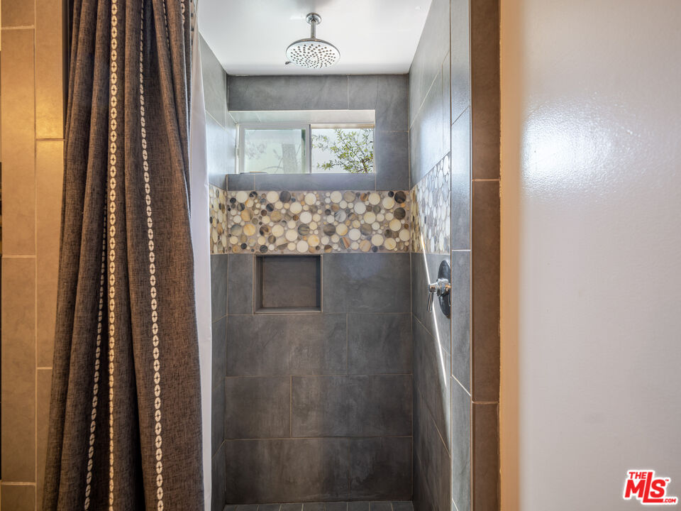 20922 Keller Road Topanga, CA 90290 - Photo 24 of 49 a view of a livingroom from a hallway