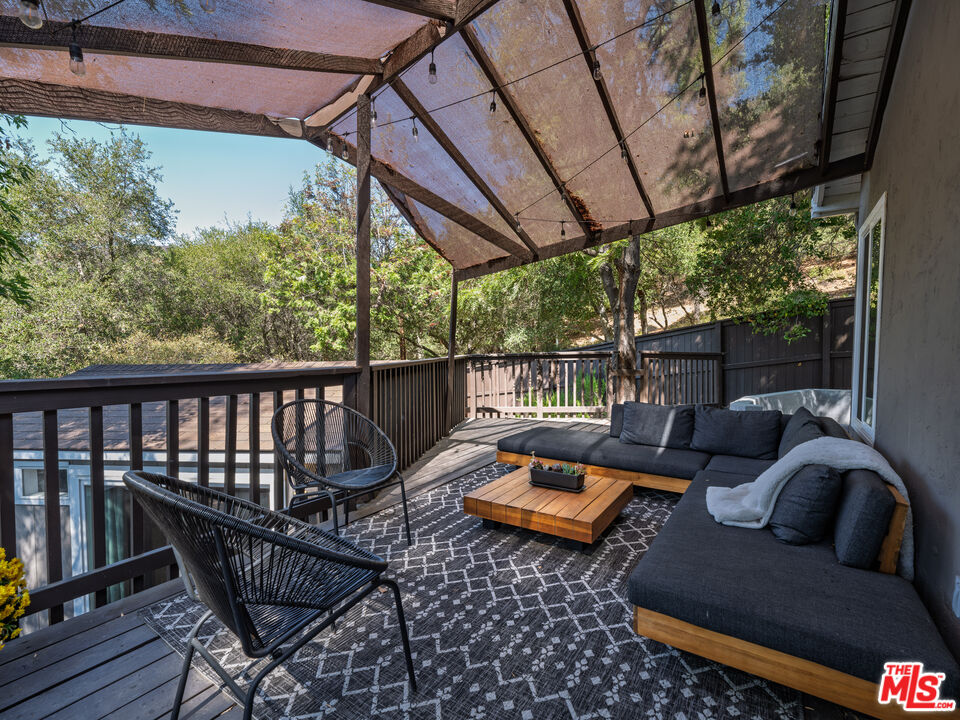 20922 Keller Road Topanga, CA 90290 - Photo 30 of 49 a roof deck with patio