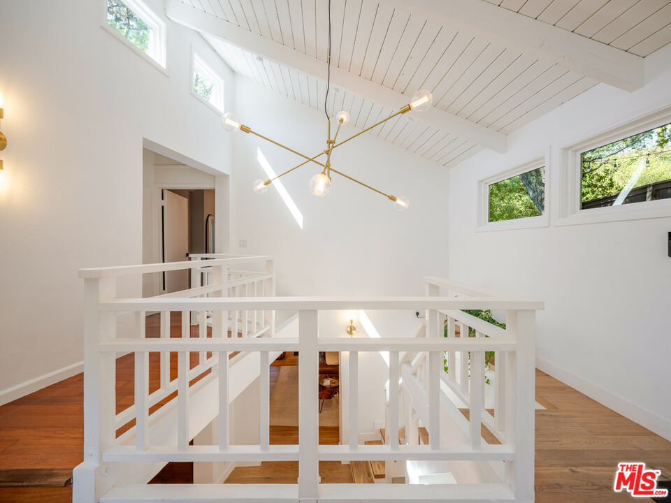 20922 Keller Road Topanga, CA 90290 - Photo 3 of 49 a view of staircase with white walls