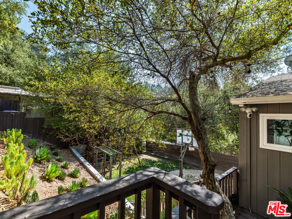 20922 Keller Road Topanga, CA 90290 - Photo 40 of 49 a front view of a house with garden