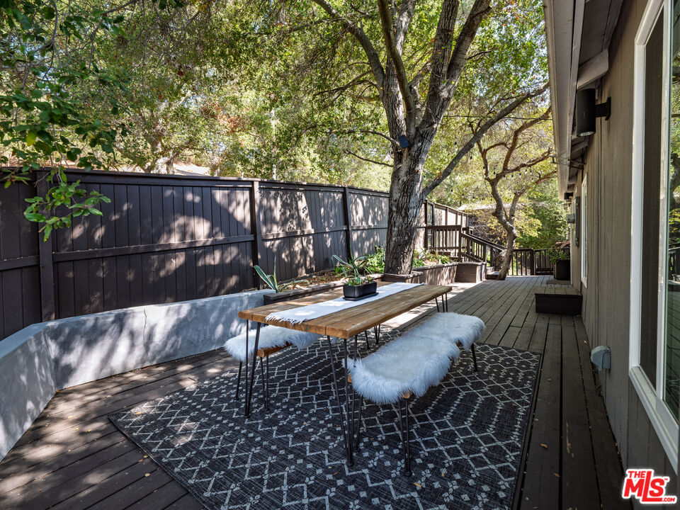 20922 Keller Road Topanga, CA 90290 - Photo 41 of 49 a view of swimming pool with a couches and chairs