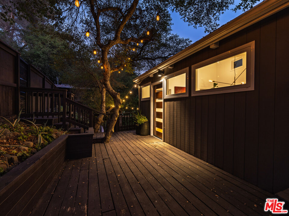 20922 Keller Road Topanga, CA 90290 - Photo 47 of 49 a view of backyard with a deck and wooden floor