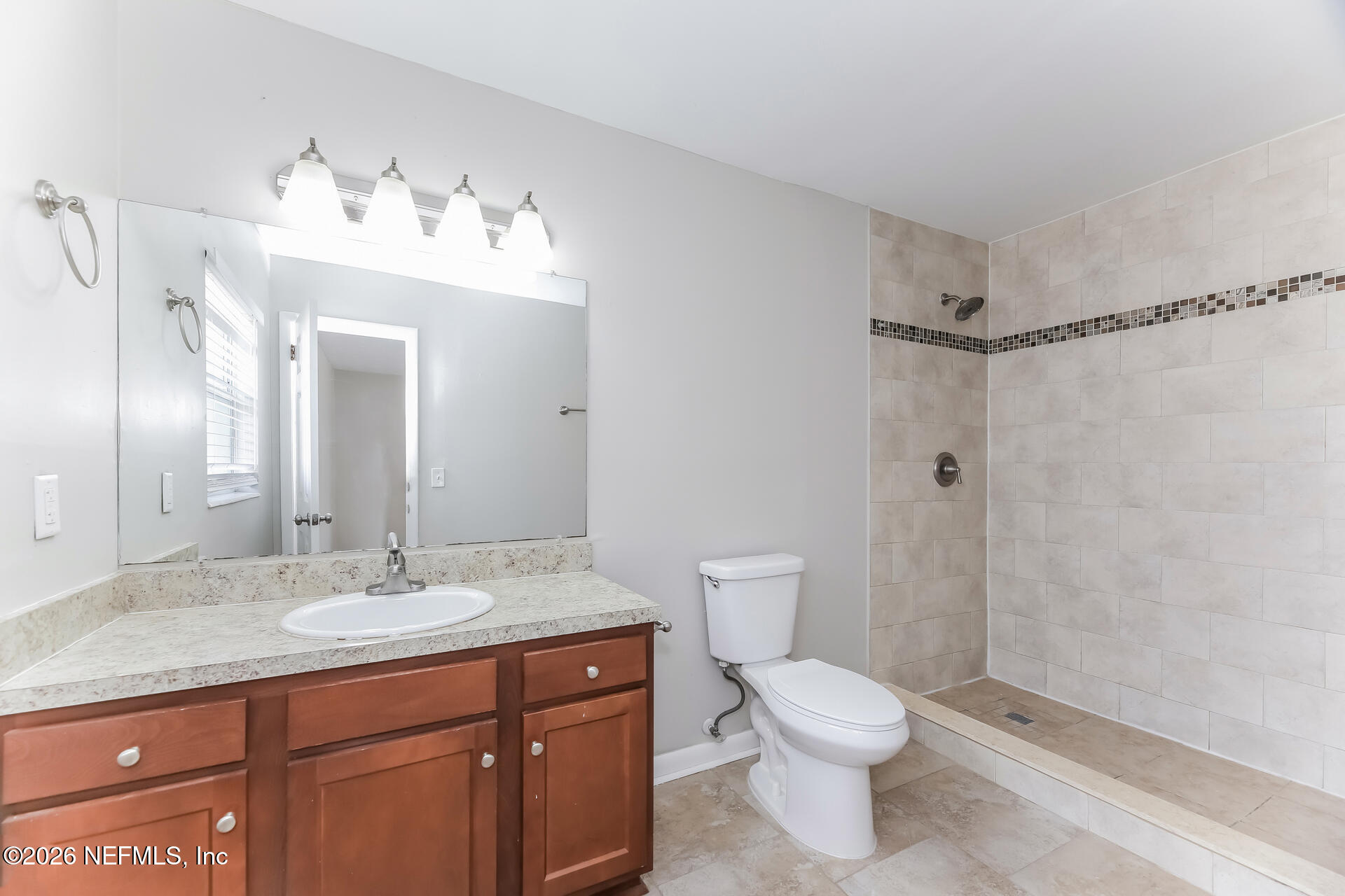 8251 Vermanth Road Jacksonville, FL 32211 - Photo 12 of 21 011-photo-main-bathroom-15517419