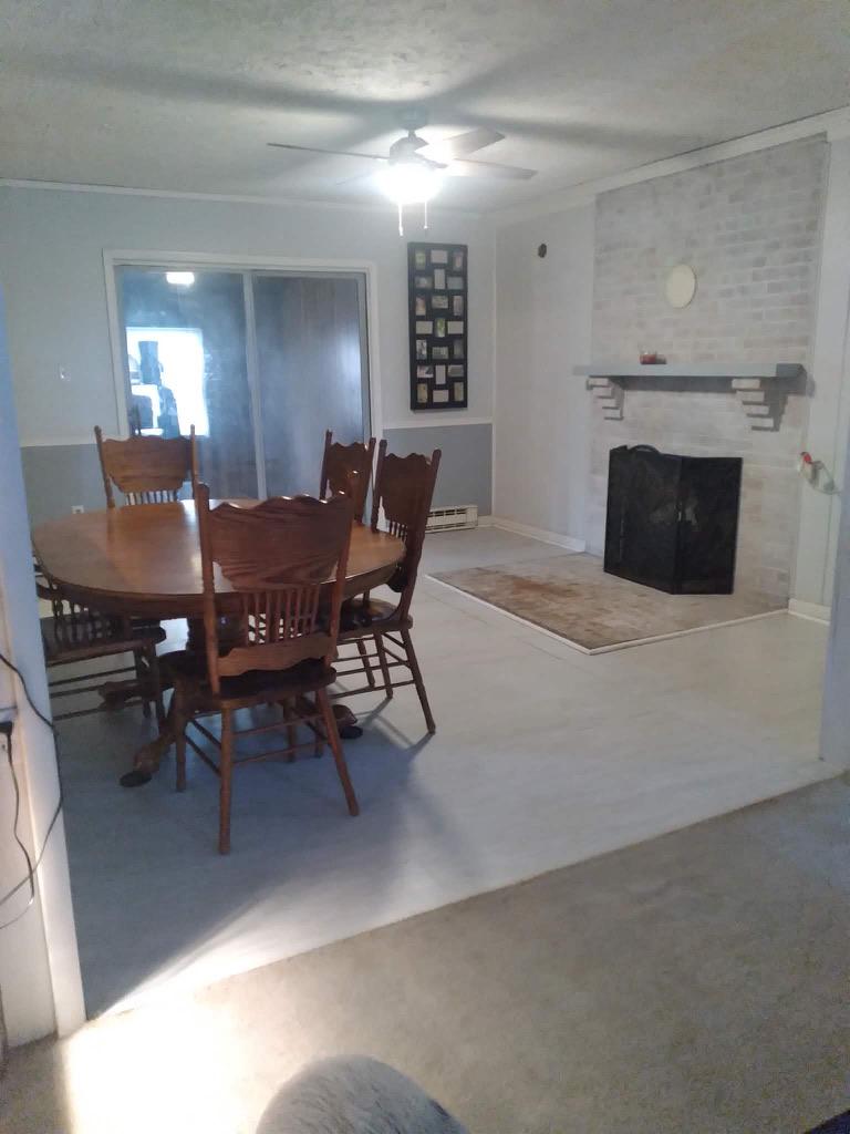 1485 South Timber Ridge Road Cross Junction, VA 22625 - Photo 6 of 12 Dining Room with Fireplace