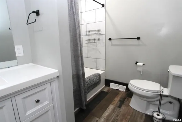 a bathroom with a sink and a toilet