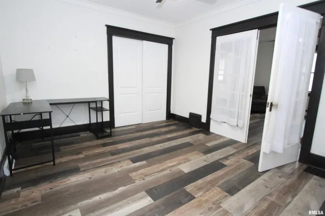 a view of a bedroom from the hallway