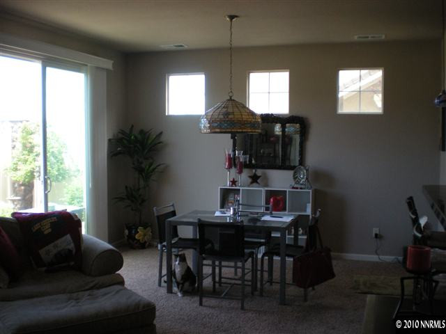 11021 Lamour Lane Reno, NV 89521 - Photo 4 of 9 a living room with furniture and a large window