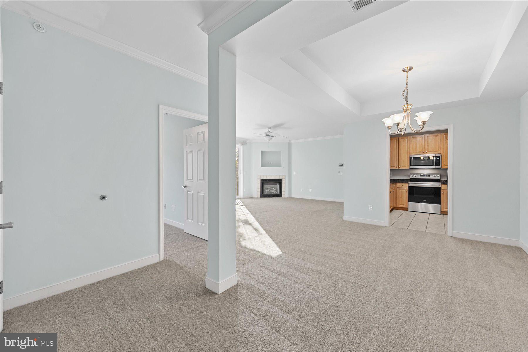 30611 Cedar Neck Road, Unit 2212 Ocean View, DE 19970 - Photo 13 of 29 a view of empty room with a kitchen