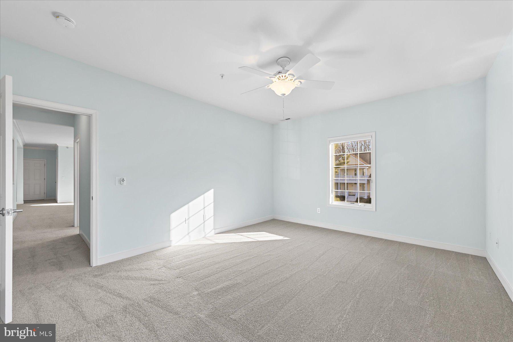 30611 Cedar Neck Road, Unit 2212 Ocean View, DE 19970 - Photo 17 of 29 a view of an empty room with a window