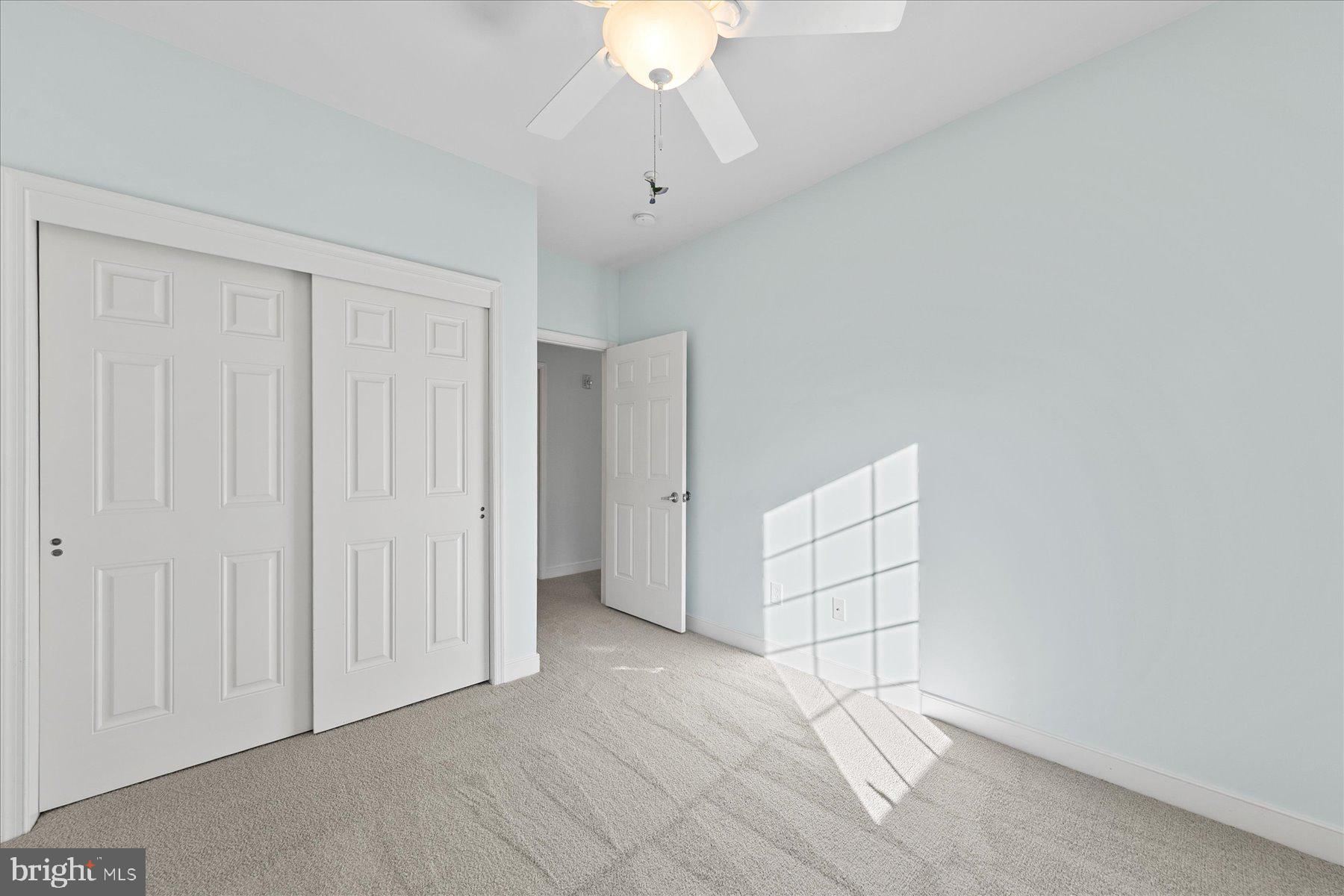 30611 Cedar Neck Road, Unit 2212 Ocean View, DE 19970 - Photo 26 of 29 a view of an empty room with a window