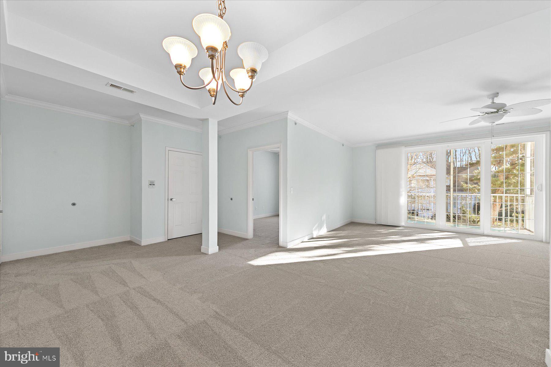 30611 Cedar Neck Road, Unit 2212 Ocean View, DE 19970 - Photo 6 of 29 a view of an empty room with a window