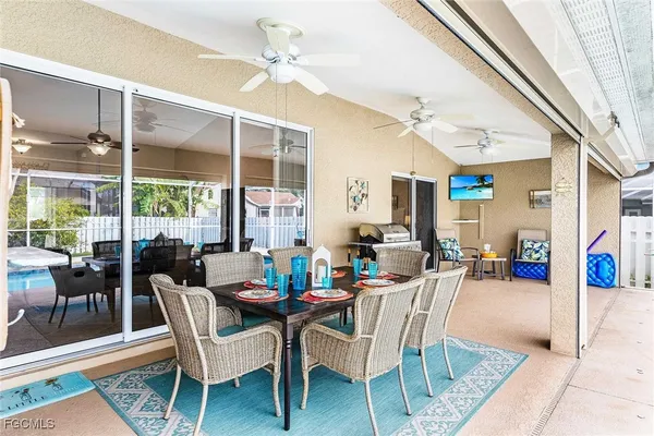 a view of a dining room with furniture window and outside view