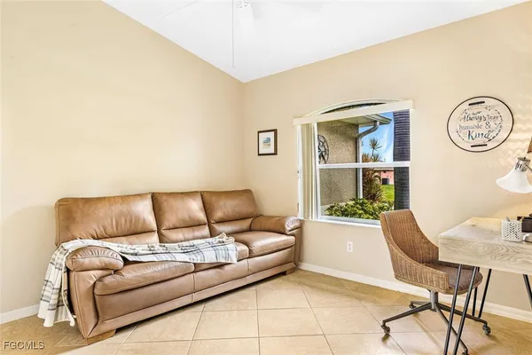 a living room with a couch and a table