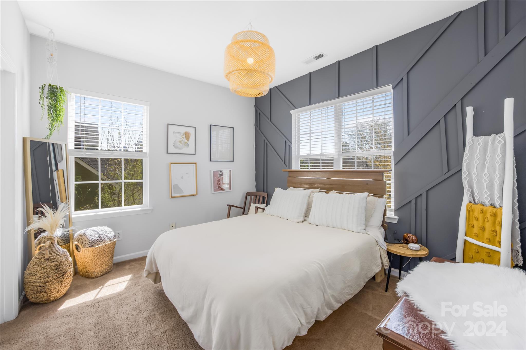 1214 Rising Oak Drive Charlotte, NC 28206 - Photo 16 of 38 a bedroom with bed and a window
