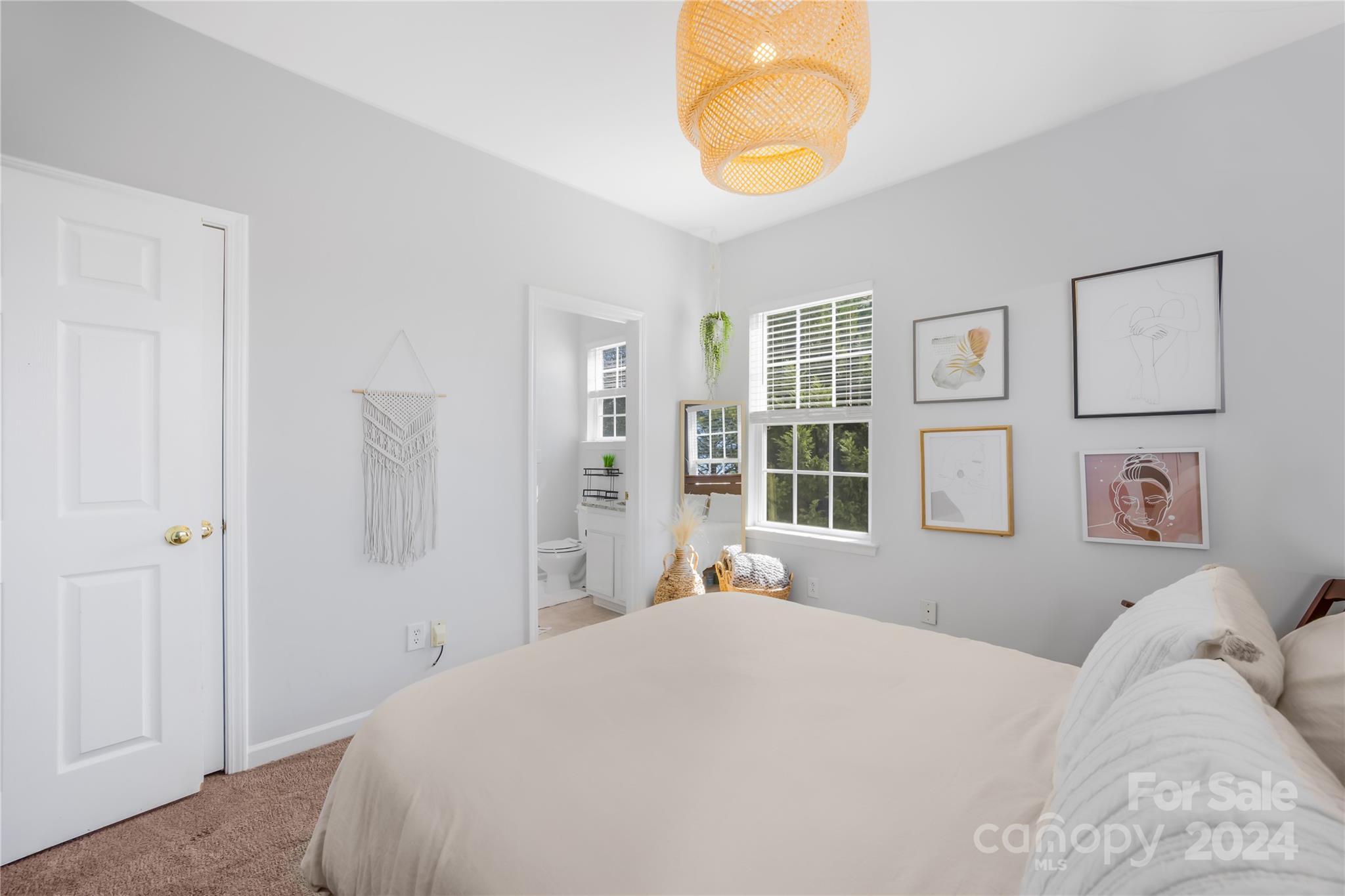 1214 Rising Oak Drive Charlotte, NC 28206 - Photo 17 of 38 a bedroom with a bed and a window
