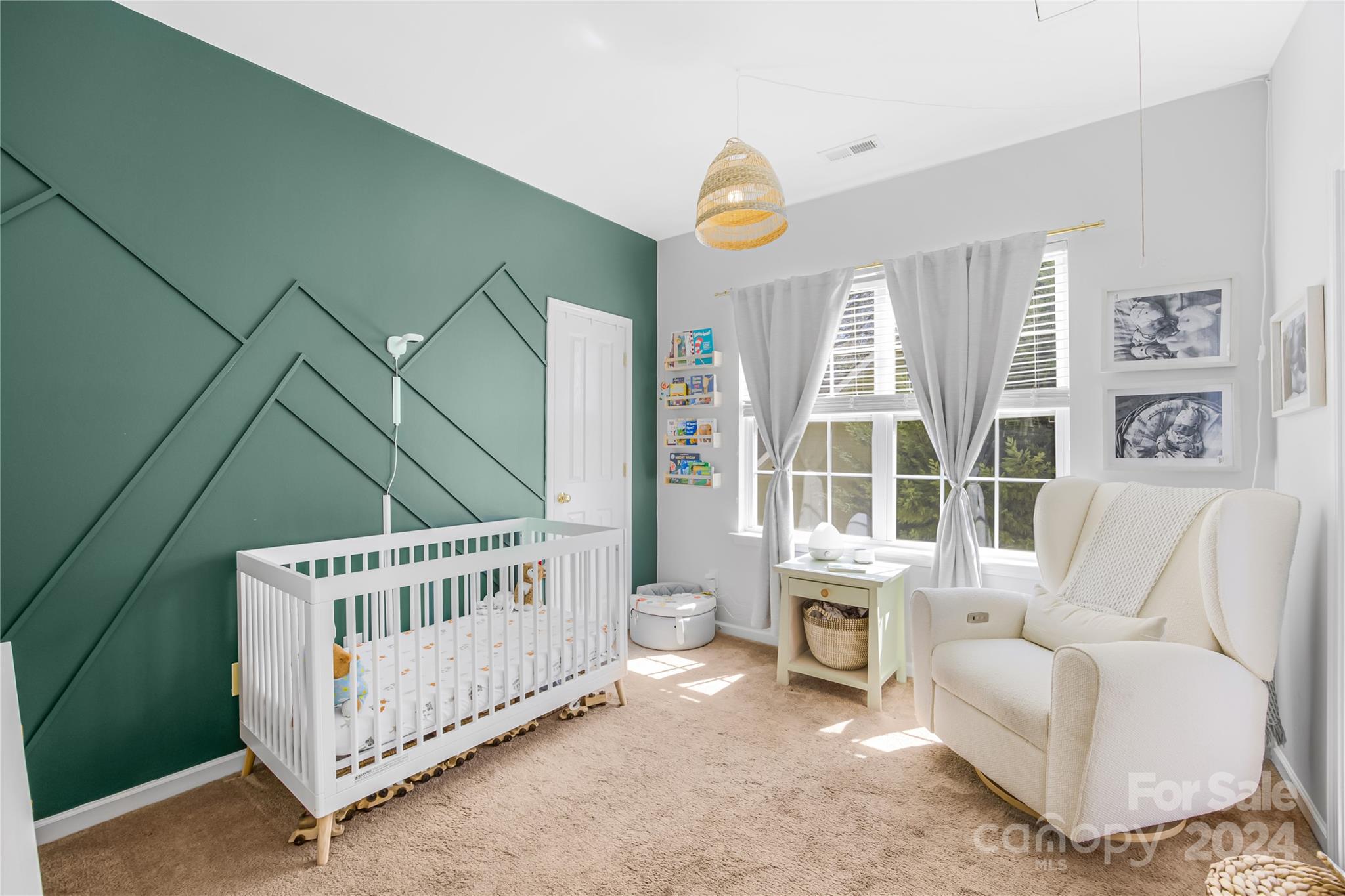 1214 Rising Oak Drive Charlotte, NC 28206 - Photo 19 of 38 a bedroom with furniture and a large window