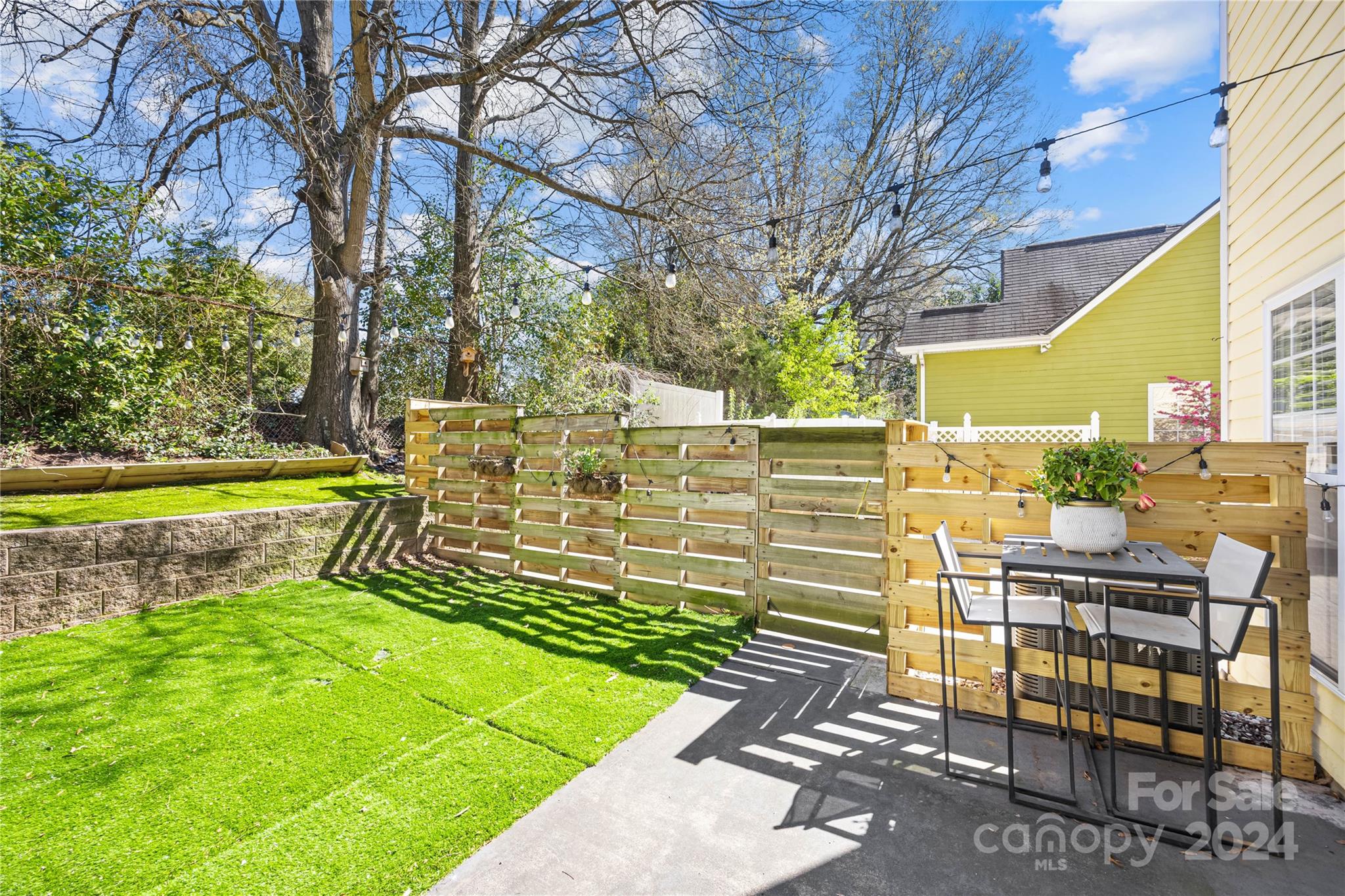 1214 Rising Oak Drive Charlotte, NC 28206 - Photo 30 of 38 a view of yard from deck having patio
