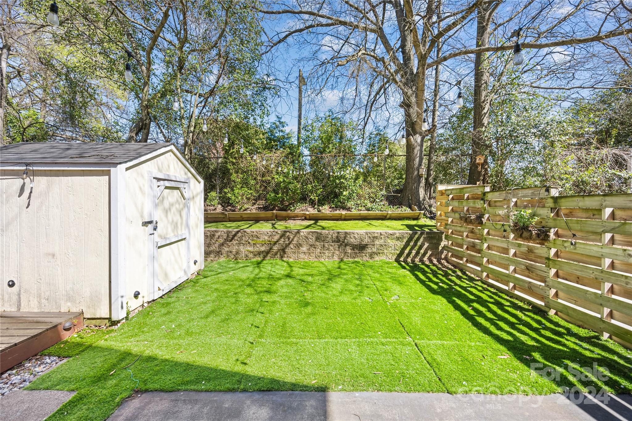 1214 Rising Oak Drive Charlotte, NC 28206 - Photo 31 of 38 a view of back yard of the house