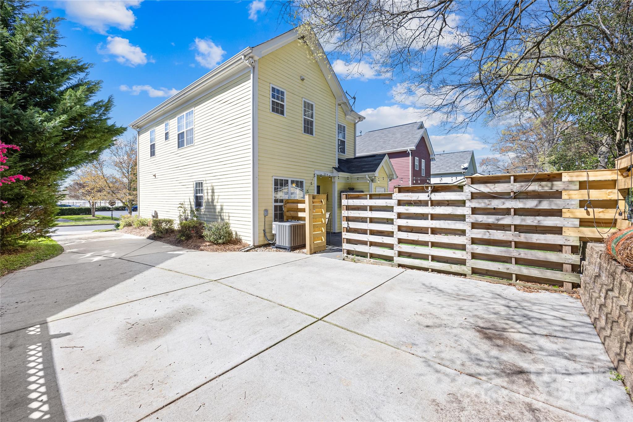 1214 Rising Oak Drive Charlotte, NC 28206 - Photo 33 of 38 a view of a house with a yard and garage