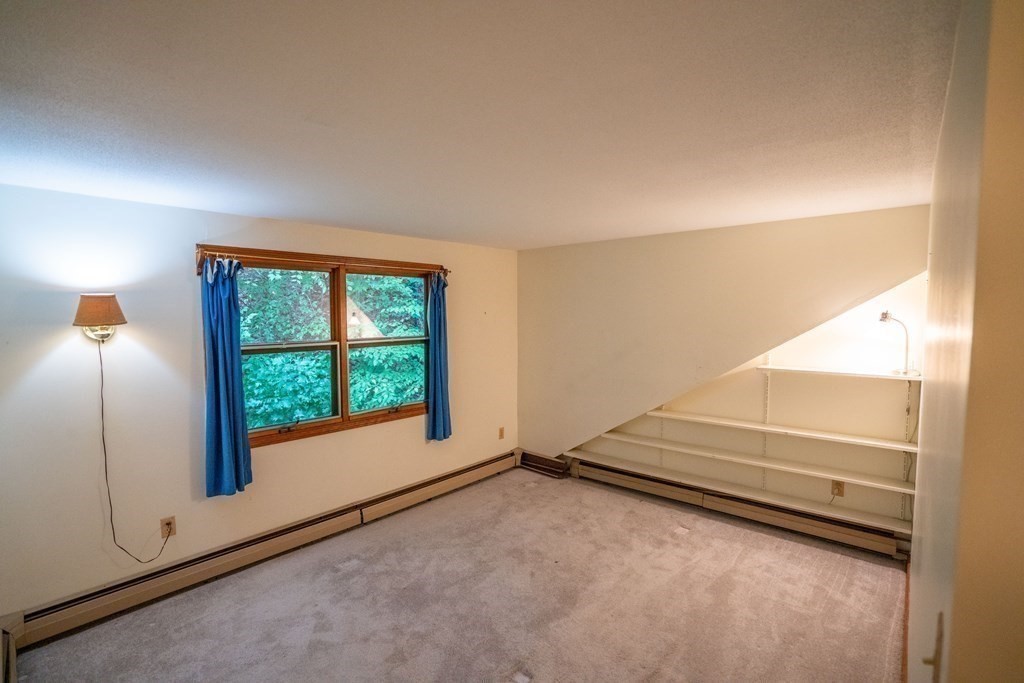 30 Harris Mountain Road Amherst, MA 01002 - Photo 34 of 42 a view of an empty room and window