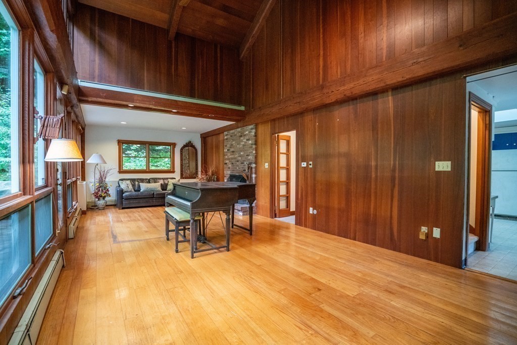 30 Harris Mountain Road Amherst, MA 01002 - Photo 7 of 42 a view of a dining room with furniture window and wooden floor