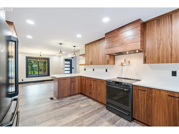a bathroom with a window and a sink