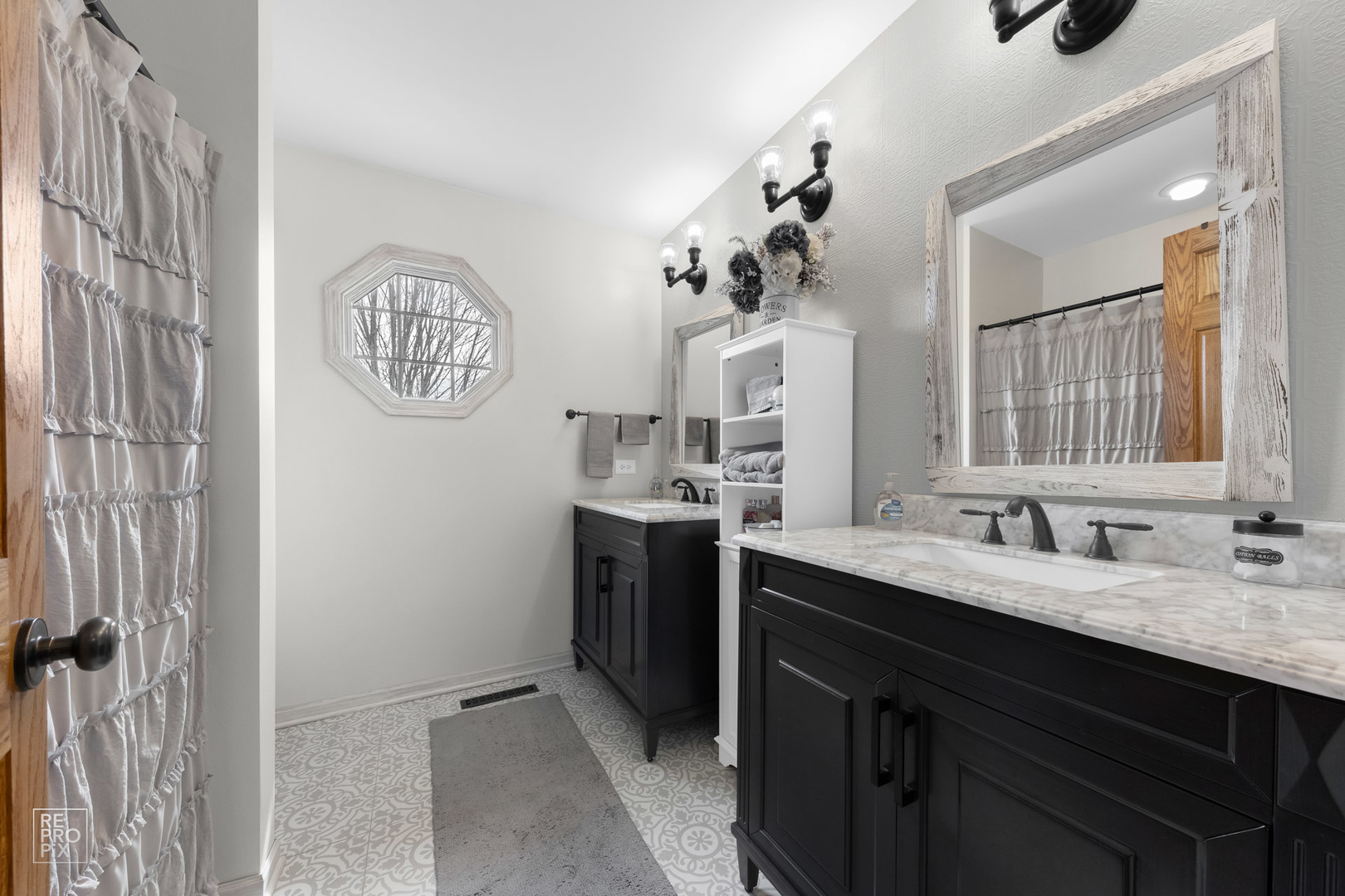 355 Meadow View Burlington, IL 60109 - Photo 19 of 37 a bathroom with a sink a vanity and a mirror