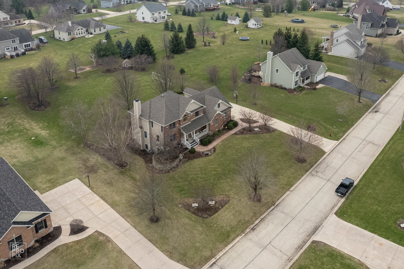 355 Meadow View Burlington, IL 60109 - Photo 35 of 37 an aerial view of a house with a yard