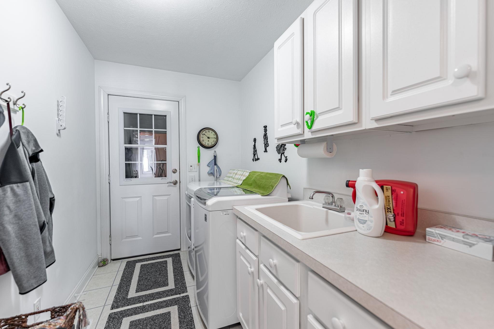 225 Secretariat's Way Belvidere, IL 61008 - Photo 15 of 41 a kitchen with a sink cabinets and a window