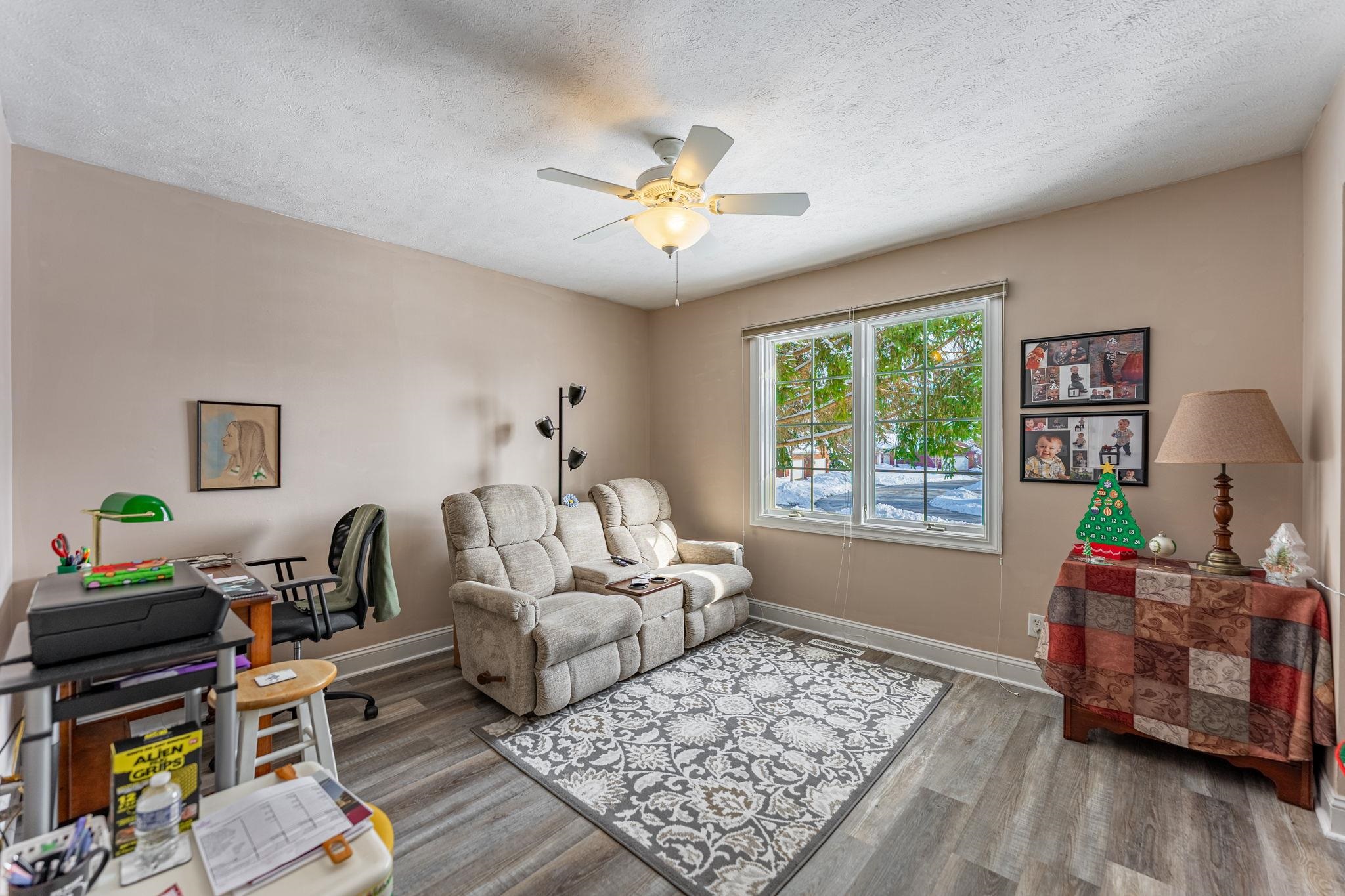 225 Secretariat's Way Belvidere, IL 61008 - Photo 23 of 41 a living room with furniture and a window