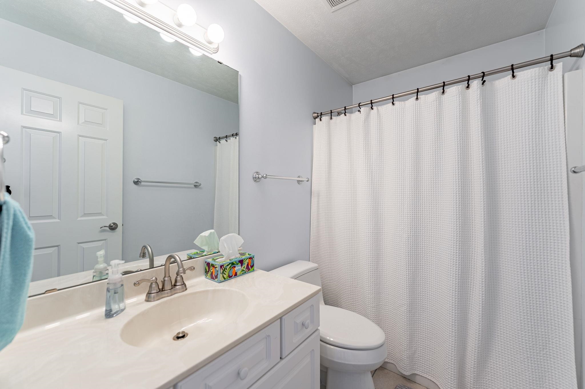 225 Secretariat's Way Belvidere, IL 61008 - Photo 24 of 41 a bathroom with a sink and a mirror