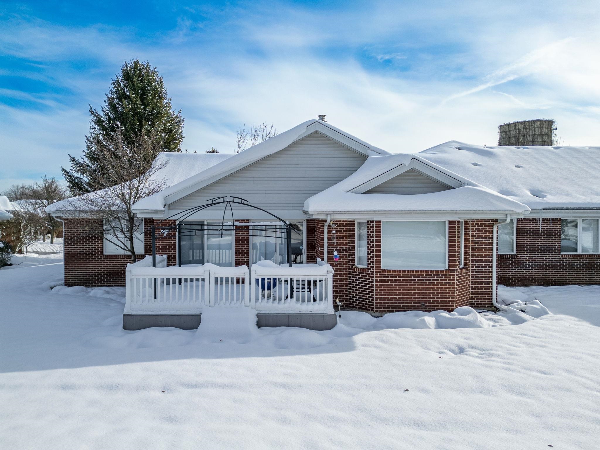 225 Secretariat's Way Belvidere, IL 61008 - Photo 34 of 41 a front view of a house with a yard and garage