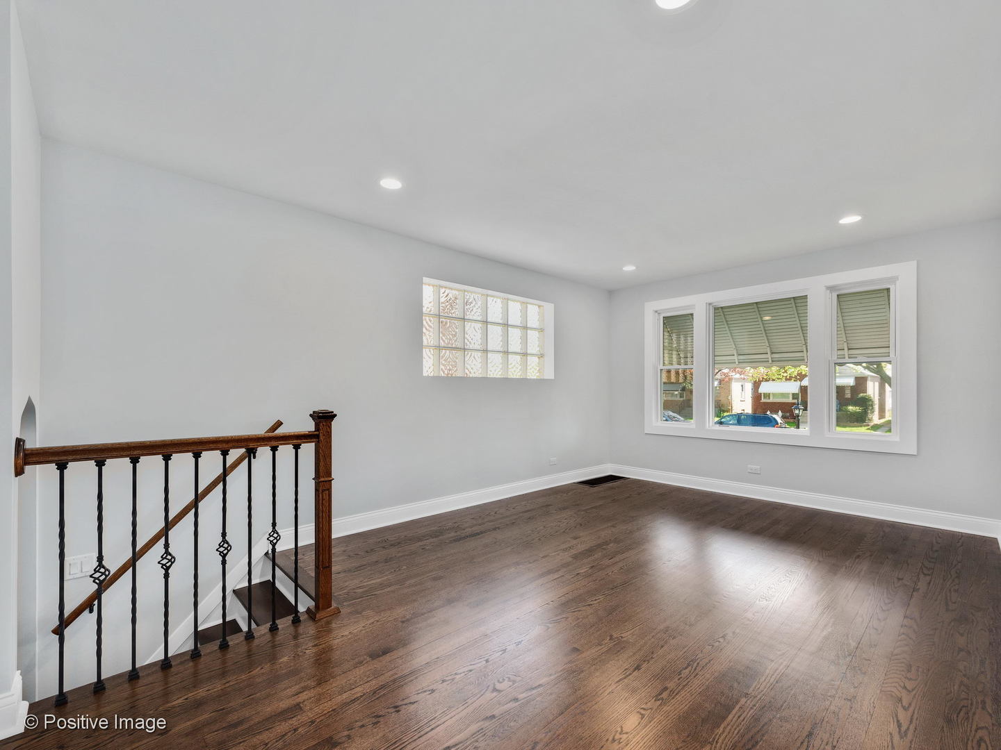 2232 Forest Avenue North Riverside, IL 60546 - Photo 3 of 17 a view of an empty room with wooden floor and a window