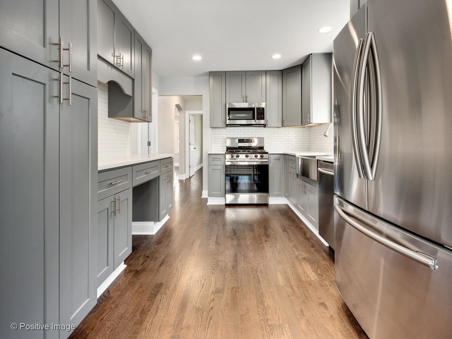 2232 Forest Avenue North Riverside, IL 60546 - Photo 6 of 17 a kitchen with stainless steel appliances a refrigerator sink and stove