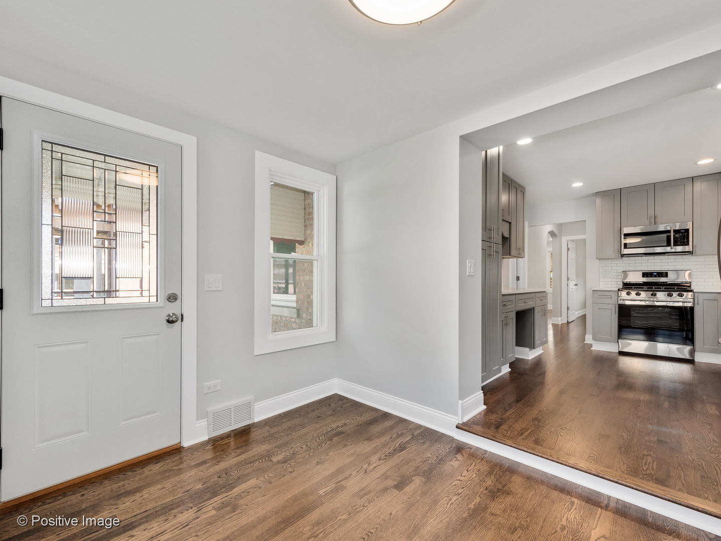 2232 Forest Avenue North Riverside, IL 60546 - Photo 8 of 17 a view of a kitchen with wooden floor and a window