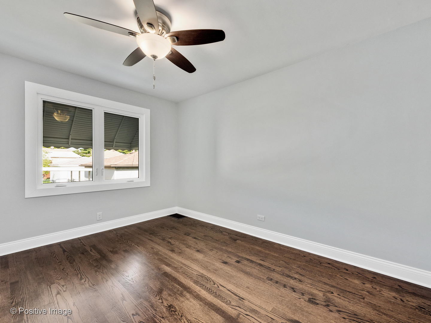 2232 Forest Avenue North Riverside, IL 60546 - Photo 9 of 17 a view of empty room with wooden floor and fan