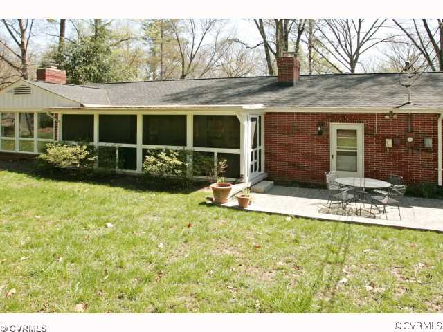 4544 Arrowhead Road Richmond, VA 23235 - Photo 10 of 12 a view of a house with backyard sitting area and garden
